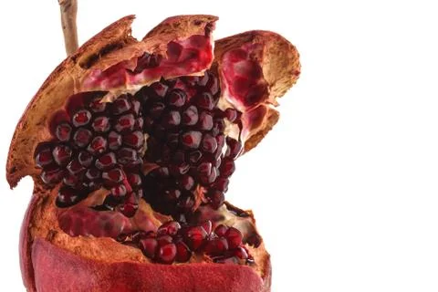 Open and macro pomegranate Stock Photos