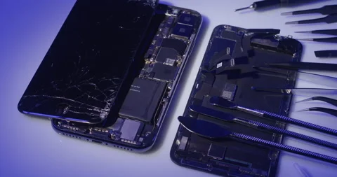 Open Apple iPhone X. Internals of Smartphone. Replaced Battery on Smartphone Stock Footage 237396909