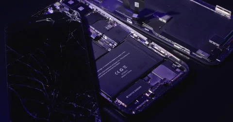 Open Apple iPhone X, replacing damaged display and battery on old Smartphone Stock Footage 237402162