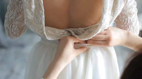 Open Back Bride's Dress. Fine Art Stock Footage 65496595