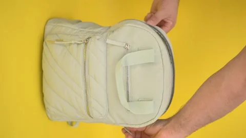 Open backpack lock, vertical video Stock Footage 257221020