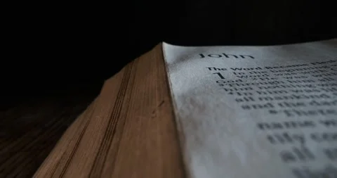 Open Bible Gospel of John macro slide  Stock Footage 257610644