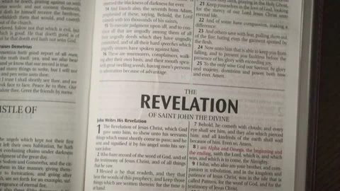 Open Bible John Revelation move down Stock Footage 236983772