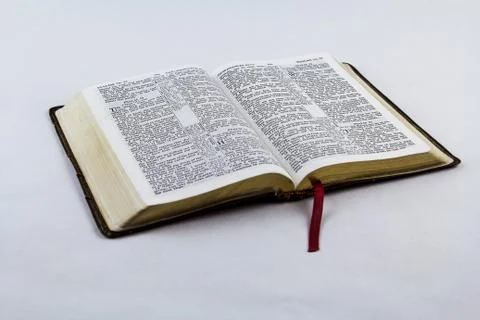 Open Bible on White Background Stock Photos