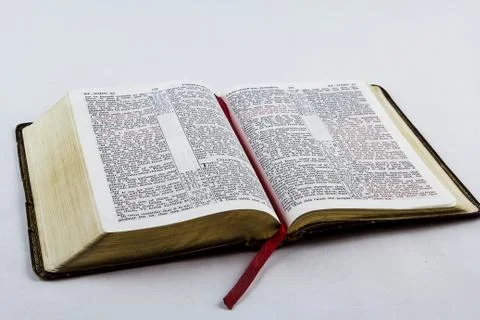 Open Bible on White Background Stock Photos
