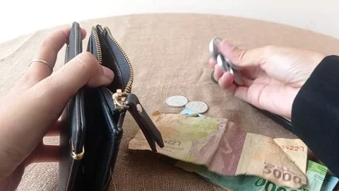 Open a black bag on a grass background Stock Footage 146252070