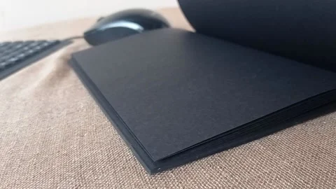 Open up a black book Stock Footage 146246840