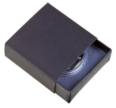 Open black gift box with silver coin Photos