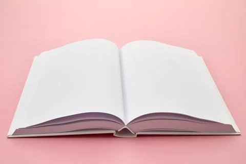 Open Blank Book on Pink Background Stock Photos