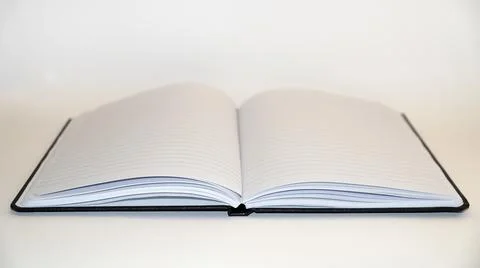 Open blank diary on white background close up Stock Photos