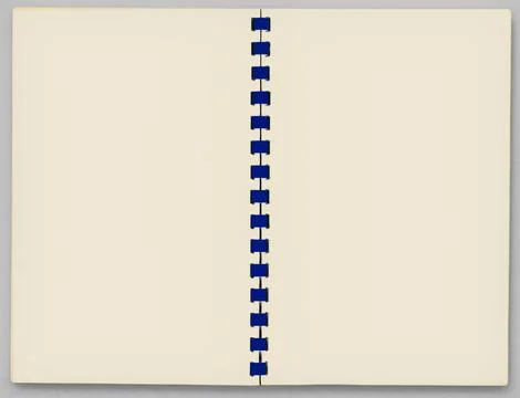 Open blank notebook with cream-colored pages and blue plastic comb binding, 스톡 사진