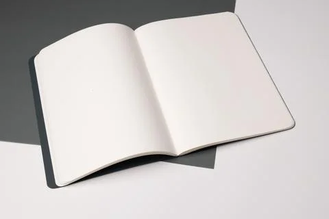 An open blank notebook rests on a desk, with copy space Stock Photos