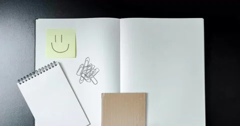 Open blank notebook with stationery accessories.  Stock Footage 234444964