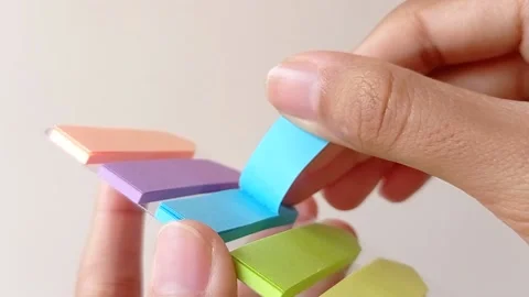 Open up a blue of colorful post-it Stock Footage 145462072