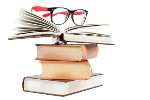 Open book and glasses on a stack of books Stock Photos