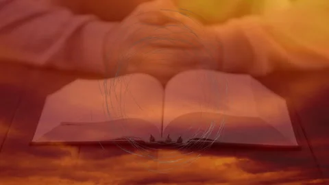 Open book with animation of abstract circular design on warm-toned background Stock Footage 303438948