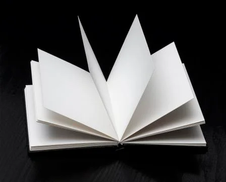 Open book on black background Foto stock