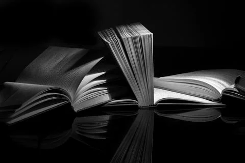 Open Book On Black Foto stock