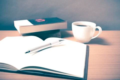 Open book with coffee Stock Photos