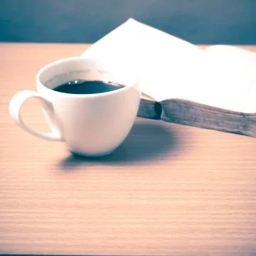 Open book with coffee Stock Photos