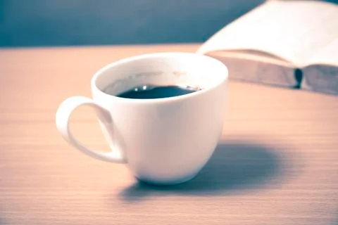 Open book with coffee Stock Photos