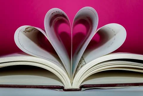 Open book creating shapes with sheets. Stock Photos