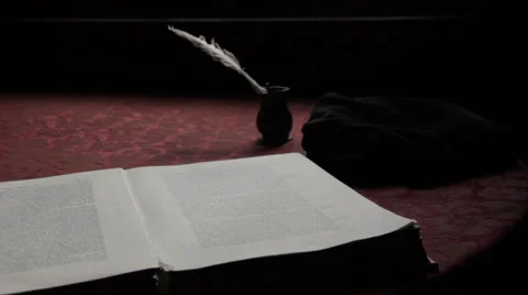 Open book with feather pen Stock Footage 51733323