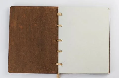 Open book with first page Stock Photos