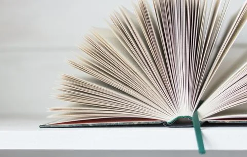 Open book isolated on white background. Stock Photos
