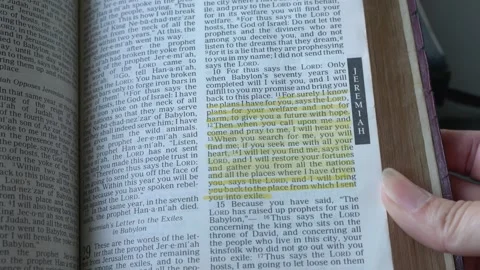 Open to the book of  Jeremiah Chapter 29. Old Testament, Holy Bible. Video stock 334313371