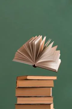 An open book levitation Stock Photos