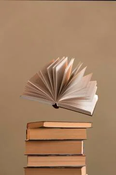 An open book levitation Stock Photos