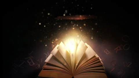 Open book with magic light and glowing letters flying out of it on wooden table Stock Footage 301543436
