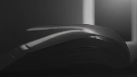 Open Book Pages Curving Under Soft Light, Still Life Stockbeeldmateriaal 335147186
