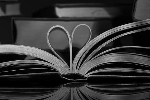 Open Book With Pages In The Shape Of A Heart. Close-up. Stock-Fotos