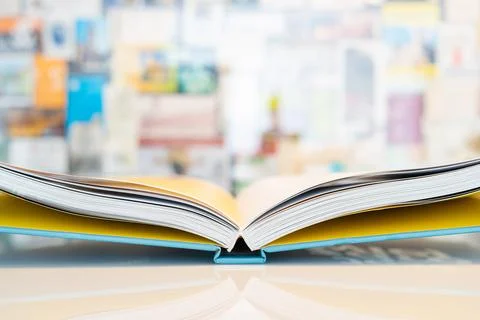 Open book with soft blurred background Stock Photos