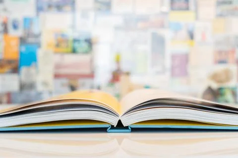 An open book with soft blurred background Stock Photos