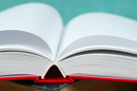 Open book, stack of hardback books. Back to school Stock Photos