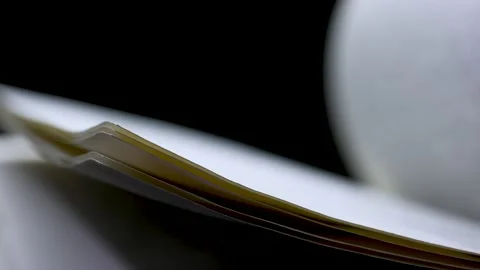 Open book in the studio on a black backg... | Stock Video | Pond5