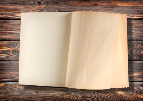 Open book on a table Stock Photos