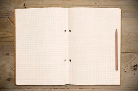 Open book on table Stock Photos