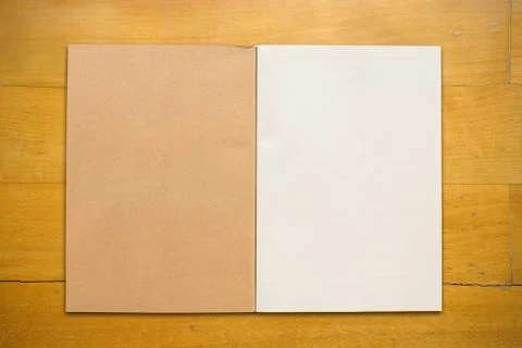 Open book on table Stock Photos