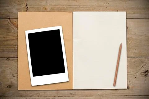 Open book on table Stock Photos