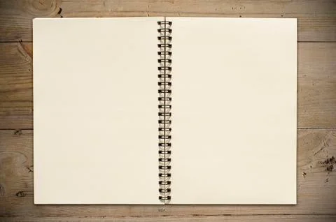 Open book on table Stock Photos