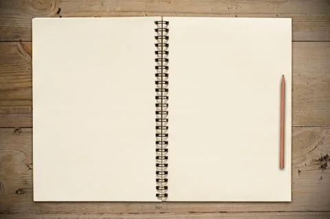 Open book on table Stock Photos