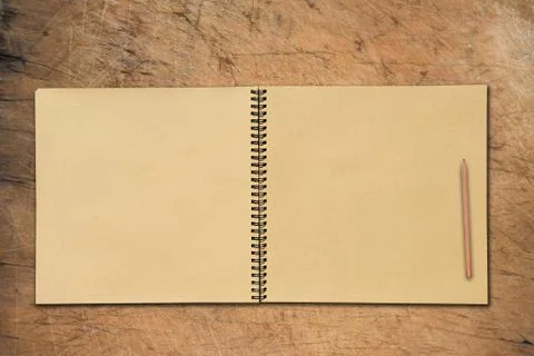 Open book on table Stock Photos