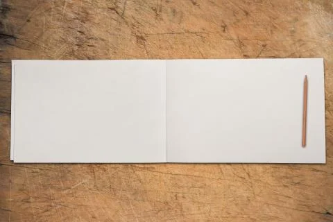 Open book on table Stock Photos