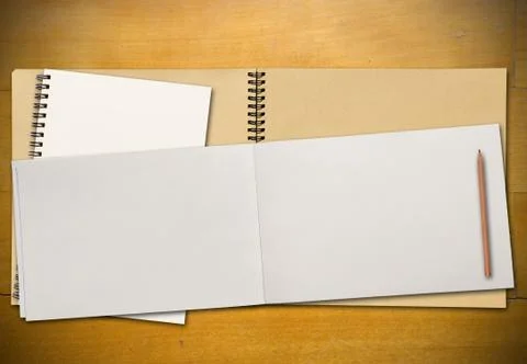 Open book on table Stock Photos