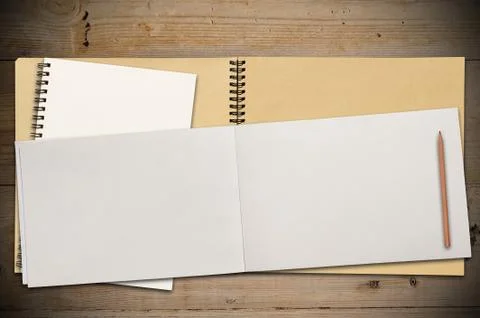 Open book on table Stock Photos