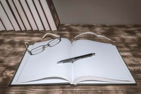 An open book on the table Stock Photos